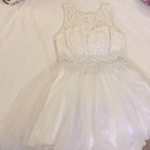 Dress. Dressy elegant tight fit on top loose fit bottom (puffy) knee high